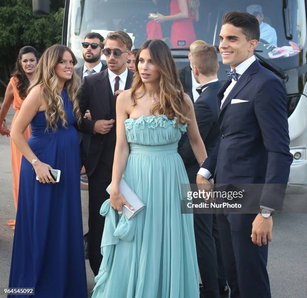 Real Betis' Spanish defender Marc Bartra and his girlfriend Melissa Jimenez attend Sergi Roberto, and the Israeli model, Coral Simanovich, wedding in...