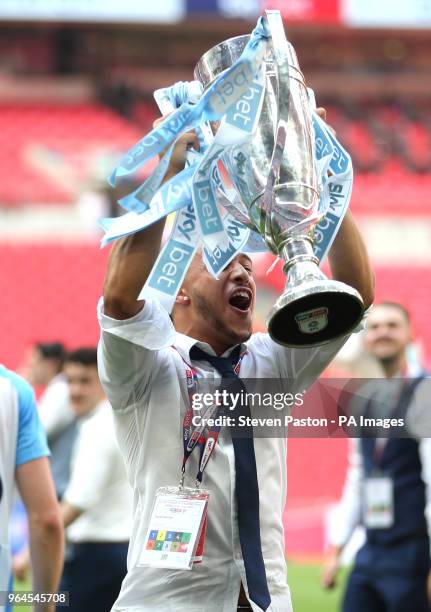 Coventry City's Jodi Jones celebrates with the trophy after the final whistle