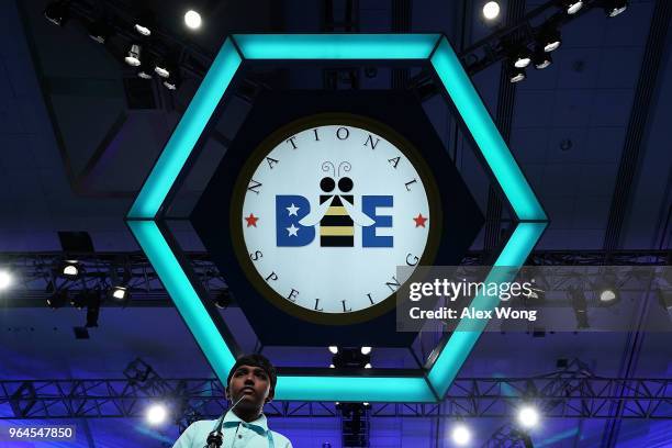 Rohan Raja of Carrollton, Texas, tries to spell his word during round five of the 91st Scripps National Spelling Bee at the Gaylord National Resort...