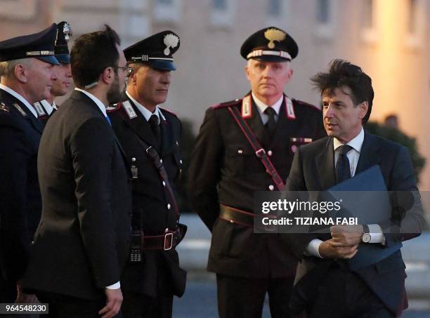 Italy's Prime minister candidate Giuseppe Conte arrives at the Qurinale presidential palace on May 31, 2018 in Rome to meets Italian President about...