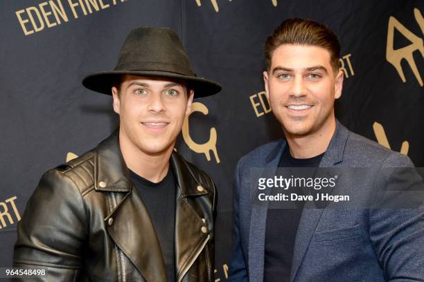 Chris Clark and Jon Clark attend Alec Monopoly's, 'Breaking the Bank on Bond Street' exhibition launch party at the Eden Fine Art Gallery on May 31,...