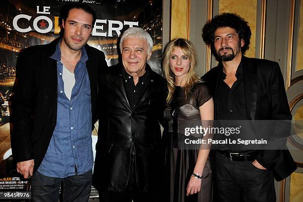 Nicolas Bedos, Guy Bedos, Actress Melanie Laurent and Director Radu Mihaileanu pose as they attend the two Millions Viewers Celebration Party for "Le...