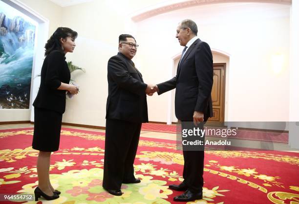 North Korean leader Kim Jong-un and Russia's Foreign Minister Sergei Lavrov shake hands during a meeting at Kumsusan Palace in Pyongyang, North Korea...