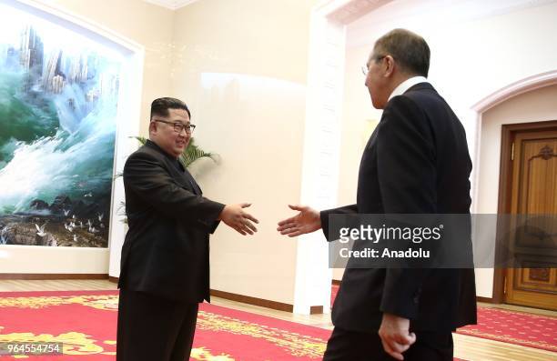 North Korean leader Kim Jong-un and Russia's Foreign Minister Sergei Lavrov shake hands during a meeting at Kumsusan Palace in Pyongyang, North Korea...