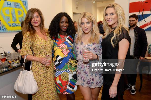 Lucy Horobin, Sarah Mulindwa, Olivia Cox and Stephanie Pratt attend Alec Monopoly's, 'Breaking the Bank on Bond Street' exhibition launch party at...