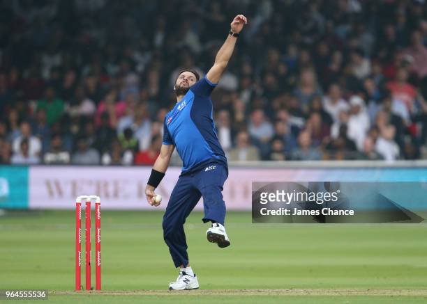 Shahid Afridi of the ICC World XI bowls during the Hurricane Relief T20 match between the ICC World XI and West Indies at Lord's Cricket Ground on...