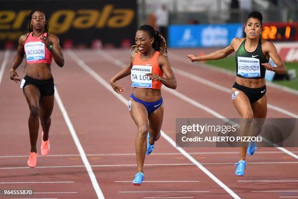 Ivory coast's Marie-Josée Ta Lou wins the women's 200m event of the IAAF Diamond League 2018 Golden Gala on May 31, 2018 at the Comunal Stadio...