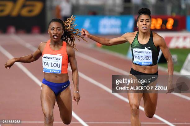 Ivory coast's Marie-Josée Ta Lou wins the women's 200m event of the IAAF Diamond League 2018 Golden Gala on May 31, 2018 at the Comunal Stadio...