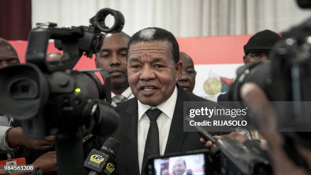 Alphonse Maka President of the Malagasy Fampihavanana Council speaks to the press at the opening of the session on May 31 in Antananarivo to try to...