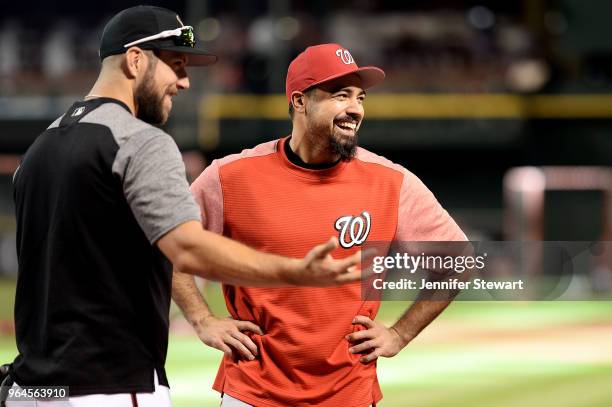 Steven Souza Jr. Of the Arizona Diamondbacks and Anthony Rendon of the Washington Nationals share a laugh on the field prior to the MLB game at Chase...