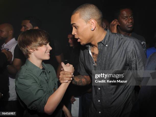 Justin Bieber and Chris Brown pose backstage at the BET-SOS Saving Ourselves Help for Haiti Benefit Concert at AmericanAirlines Arena on February 5,...