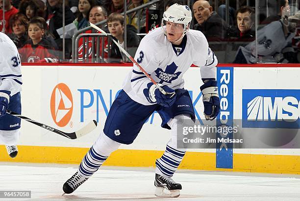 Dion Phaneuf of the Toronto Maple Leafs skates against the New Jersey Devils at the Prudential Center on February 5, 2010 in Newark, New Jersey. The...