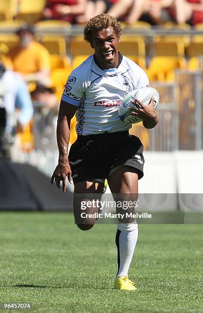 Osea Kolinsau of Fiji runs in a try in the Quarter Final Cup match between Fiji and South Africa during day two of the Wellington IRB Sevens at...