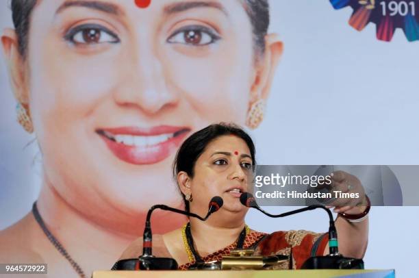 Union Textile Minister Smriti Irani speaks during an interactive session with Merchants' Chamber of Commerce and Industry at Grand Hotel on May 31,...