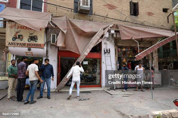 South Delhi Municipal Corporation demolished encroachments during an anti-encroachment drive at Dakshinpuri near Pushpa Bhawan road, on May 31, 2018...