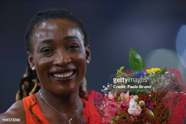 Marie-Josee Ta Lou of the Ivory Coast celebrates after winning the women's 200m during the IAAF Golden Gala Pietro Mennea at Olimpico Stadium on May...