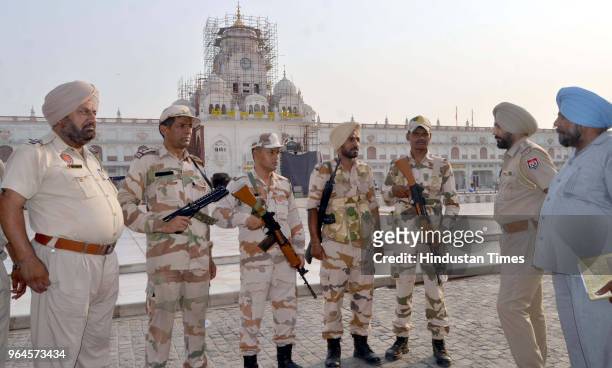 Personnel and Punjab police deployed outside Golden Temple ahead of 34th anniversary of Operation Bluestar on May 30, 2018 in Amritsar, India. With...
