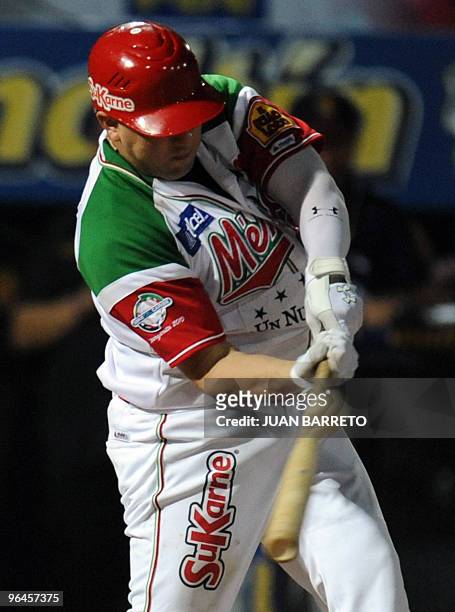Chris Roberson of Naranjeros de Hermosillo of Mexico bats the ball during a Caribbean Series baseball match against Leones del Caracas of Venezuela...