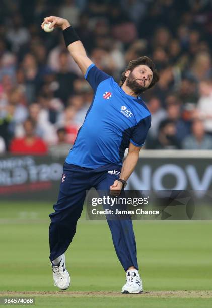 Shahid Afridi of the ICC World XI bowls during the Hurricane Relief T20 match between the ICC World XI and West Indies at Lord's Cricket Ground on...