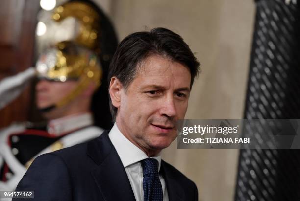 Italy's newly appointed Prime minister Giuseppe Conte leaves after announcing the list of his government at the Quirinale presidential palace on May...