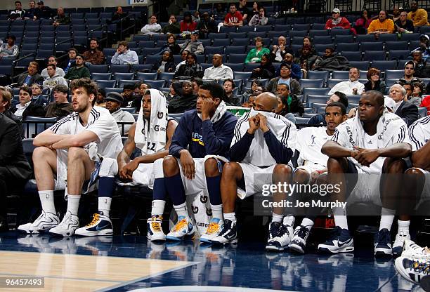 Marc Gasol, O.J. Mayo, Rudy Gay, Jamal Tinsley, Mike Conley and Zach Randolph of the Memphis Grizzlies sit on the bench in the final minutes of a...