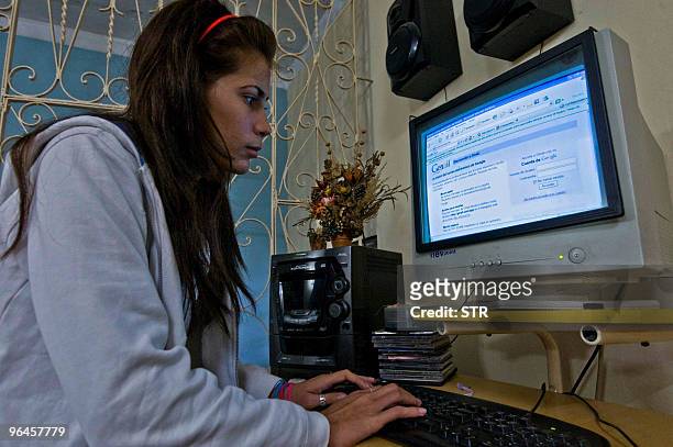 Lifestyle-Cuba-Internet-politics,FEATURE, by Isabel Sanchez A Cuban teenager enters her e-mail account at her house, on January 28, 2010 in Havana....