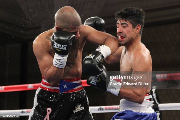 Rafael Vazquez lands a left hand against Pedro Melo at the Hilton Westchester on April 08, 2015 in Rye Brook, New York. Vazquez won by unanimous...