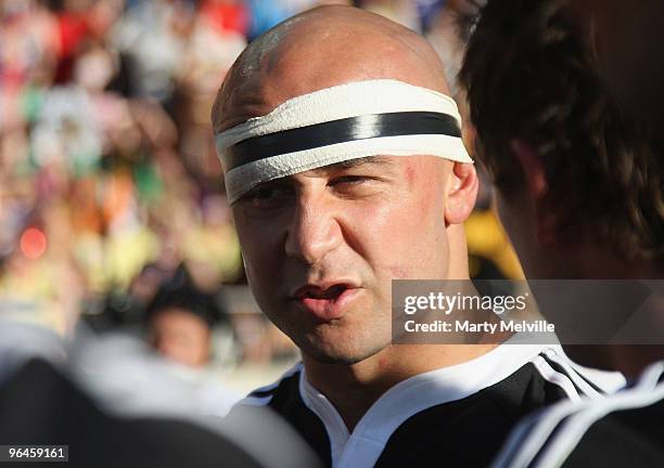 Forbes captain of New Zealand talks to the team after the Semi Final Cup match between New Zealand and Samoa during day two of the Wellington IRB...