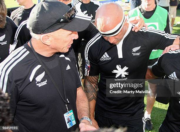 Gordon Tietjens head coach of New Zealand talks to DJ Forbes captain after the Semi Final Cup match between New Zealand and Samoa during day two of...