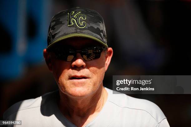 Manager Ned Yost of the Kansas City Royals looks on from the dugout as the Royals play the Texas Rangers during the sixth inning at Globe Life Park...