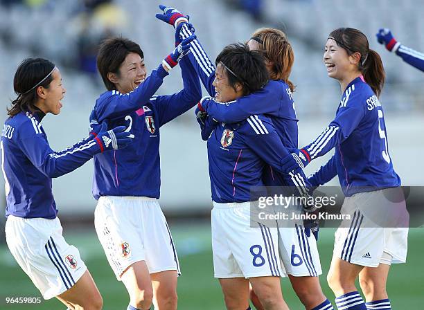 Aya Miyama of Japan celebrates with teammates after scoring goal during the East Asian Football Federation Women's Football Championship 2010 match...