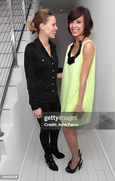 Hilary Swank and Jessica Alba attend the Superbowl XLIV with Audi at the W Hotel - South Beach on February 5, 2010 in Miami Beach, Florida.