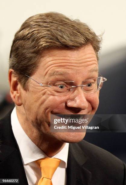 German Foreign Minister Guido Westerwelle laughs during the second day of the 46th Munich Security Conference at the hotel Bayerischer Hof on...