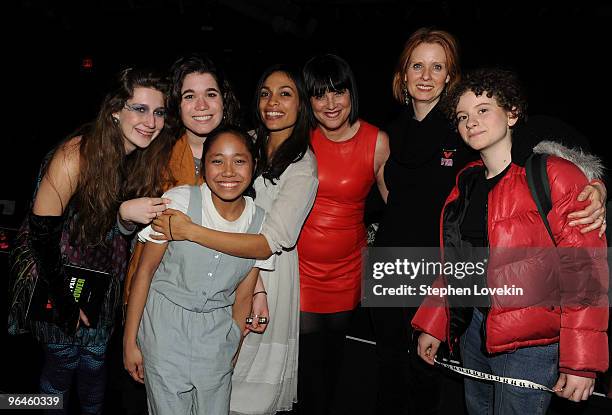 Actress Rosario Dawson, writer Eve Ensler, actress Cynthia Nixon and her daughter Samantha Mozes pose with cast members at the V-Day benefit reading...