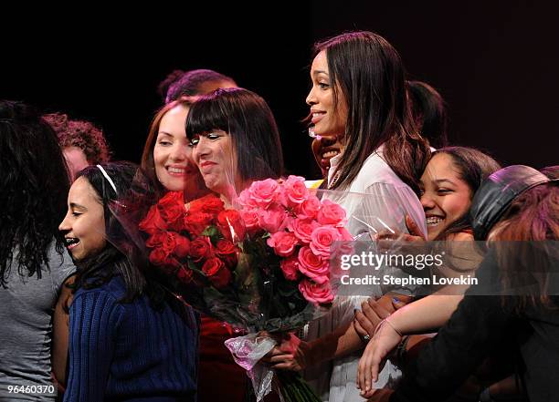 Writer Eve Ensler and actress Rosario Dawson pose with cast members at the V-Day benefit reading of Eve Ensler's new work "I Am An Emotional...