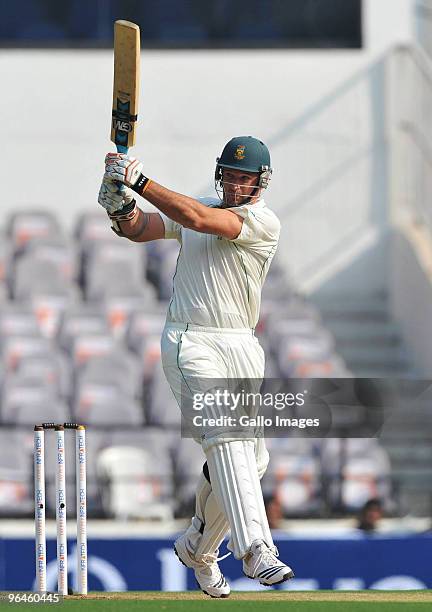 Graeme Smith of South Africa hits out during the first day of the first test between India and South Africa at Vidarbha Cricket Association Ground on...