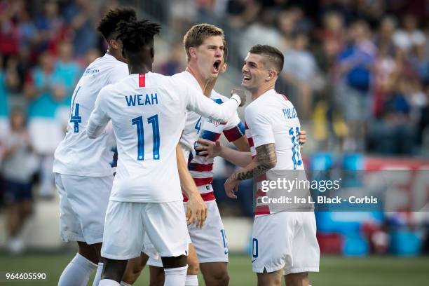 Walker Zimmerman of the US Men's National Team celebrates his 1st national team goal with teammates during the International Friendly Match between...