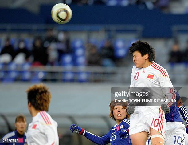 China's forward Ma Xiaoxu heads the ball during their match at the EAFF Women's Football Championships 2010 against Japan in Tokyo on Feburary 6,...