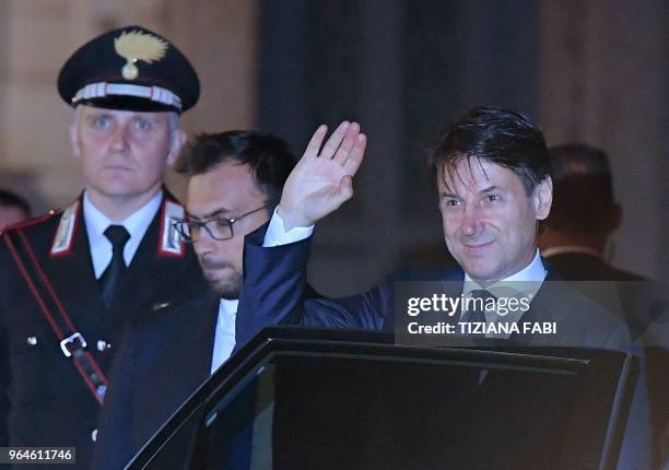 Italy's newly appointed Prime minister Giuseppe Conte leaves after announcing the list of his government at the Quirinale presidential palace on May...