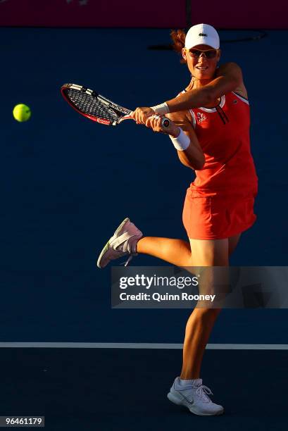 Sam Stosur of Australia plays a backhand in her singles match against Maria Jose Martinez Sanchez of Spain during the 2010 Fed Cup World Group II tie...