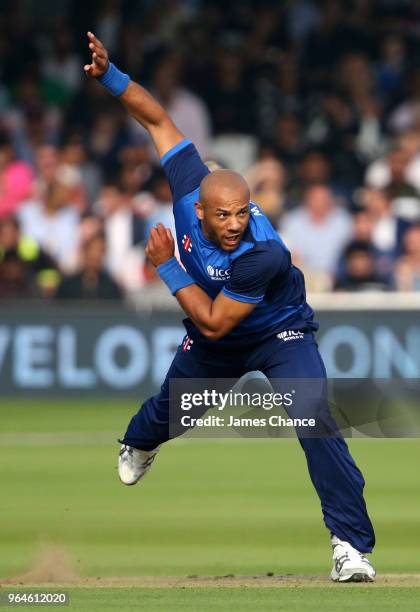 Tymal Mills of the ICC World XI bowls during the Hurricane Relief T20 match between the ICC World XI and West Indies at Lord's Cricket Ground on May...