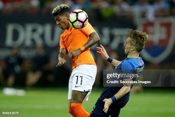 Patrick van Aanholt of Holland, Peter Pekarik of Slovakia during the International Friendly match between Slovakia v Holland at the City Arena on May...