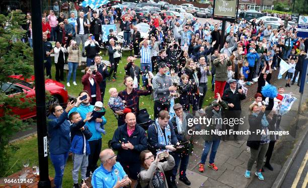 Coventry City fans during the Sky Bet League Two promotion parade in Coventry.Coventry City fans during the Sky Bet League Two promotion parade in...