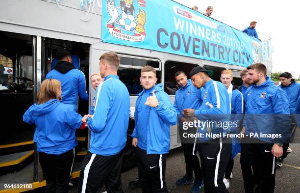 Coventry City's Josh Barrett makes his way onto the bus during the Sky Bet League Two promotion parade in Coventry.