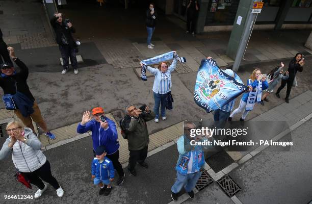 Coventry City fans during the Sky Bet League Two promotion parade in Coventry.Coventry City fans during the Sky Bet League Two promotion parade in...