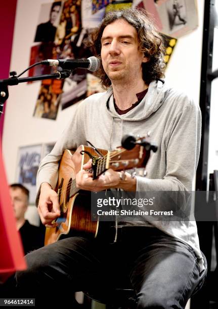 Gary Lightbody of Snow Patrol during an in-store signing and performance of their new album 'Wildness' at HMV Manchester on May 31, 2018 in...