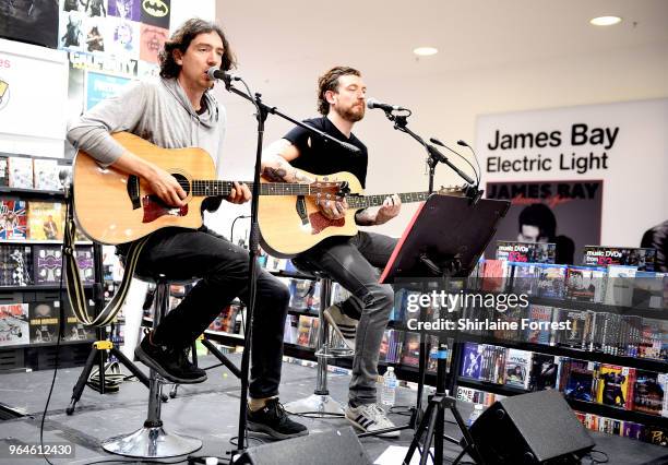 Gary Lightbody and Nathan Connolly of Snow Patrol during an in-store signing and performance of their new album 'Wildness' at HMV Manchester on May...