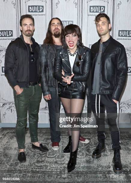 Musicians Josh Smith, Joe Hottinger, singer Lzzy Hale and musician Arejay Hale from Halestorm attend the Build Series to discuss at Build Studio on...