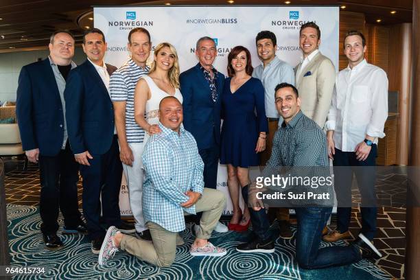 Radio Personality and Godfather to Norwegian Bliss Elvis Duran poses for a photo with the cast of the Elvis Duran and The Morning Show on board...