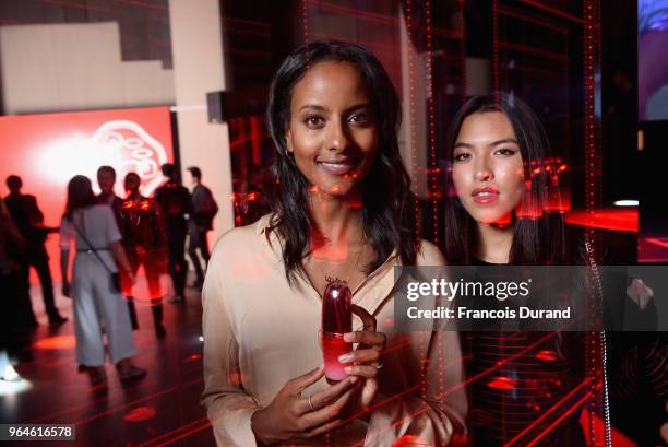 Sara Nuru and a guest attend the #Ultimune Launch Event on May 31, 2018 in Paris, France.